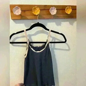 Brandy Melville tank top with crochet details.